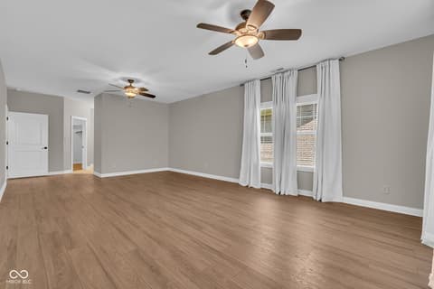 Primary bedroom at 5666 Augusta Woods Drive, Plainfield, IN