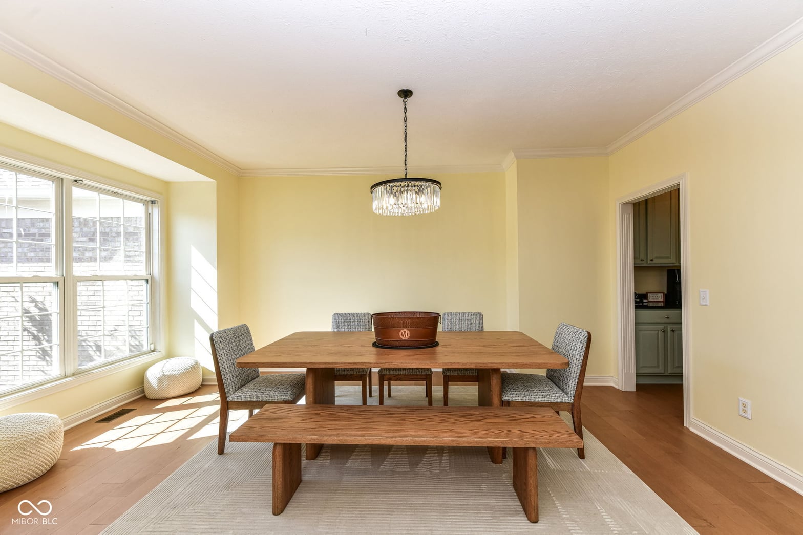 Bright, airy dining room with abundant natural light.