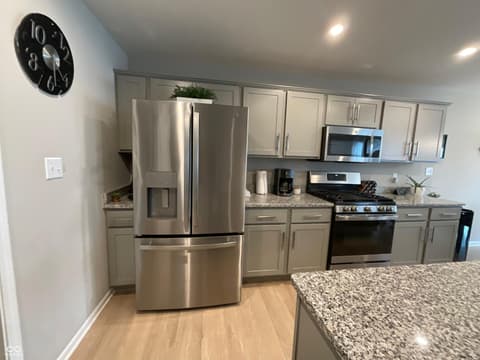 Kitchen at 19366 Goins Boulevard, Westfield, IN — Modern kitchen with stainless steel appliances and granite.