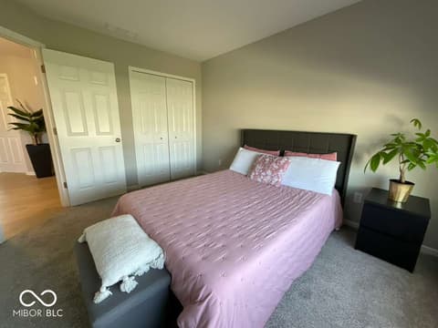 Primary bedroom at 19366 Goins Boulevard, Westfield, IN — Spacious primary bedroom with ample closet storage.