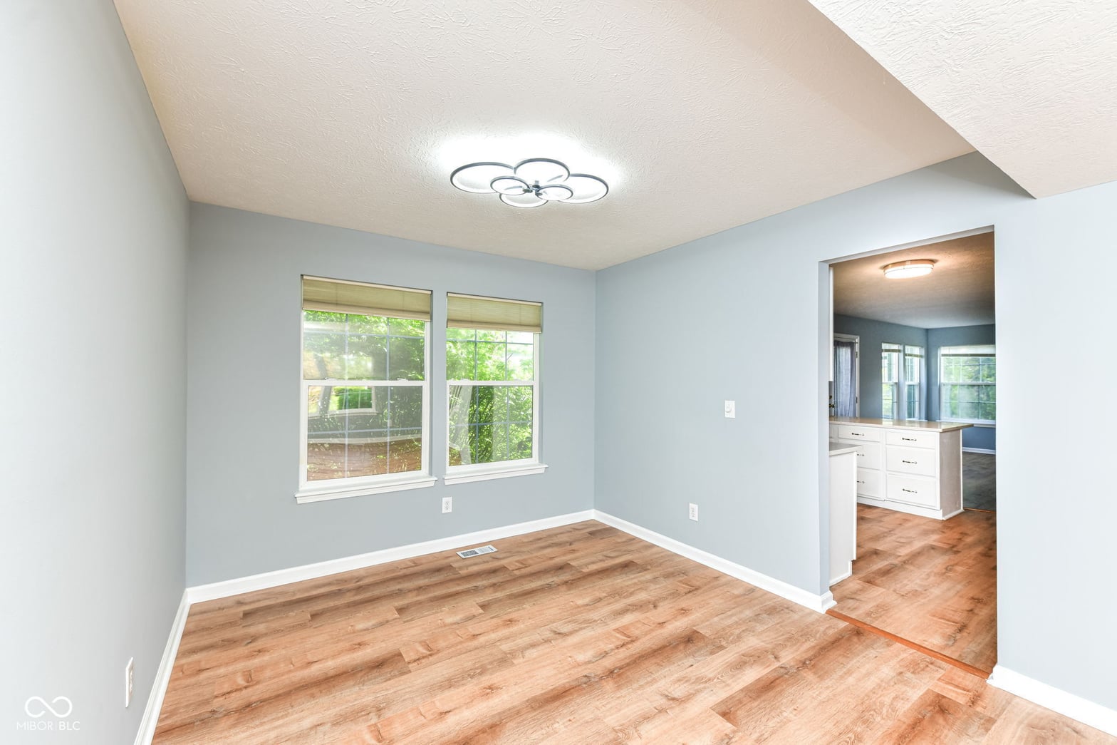 Bright primary suite with vaulted ceilings and ensuite.