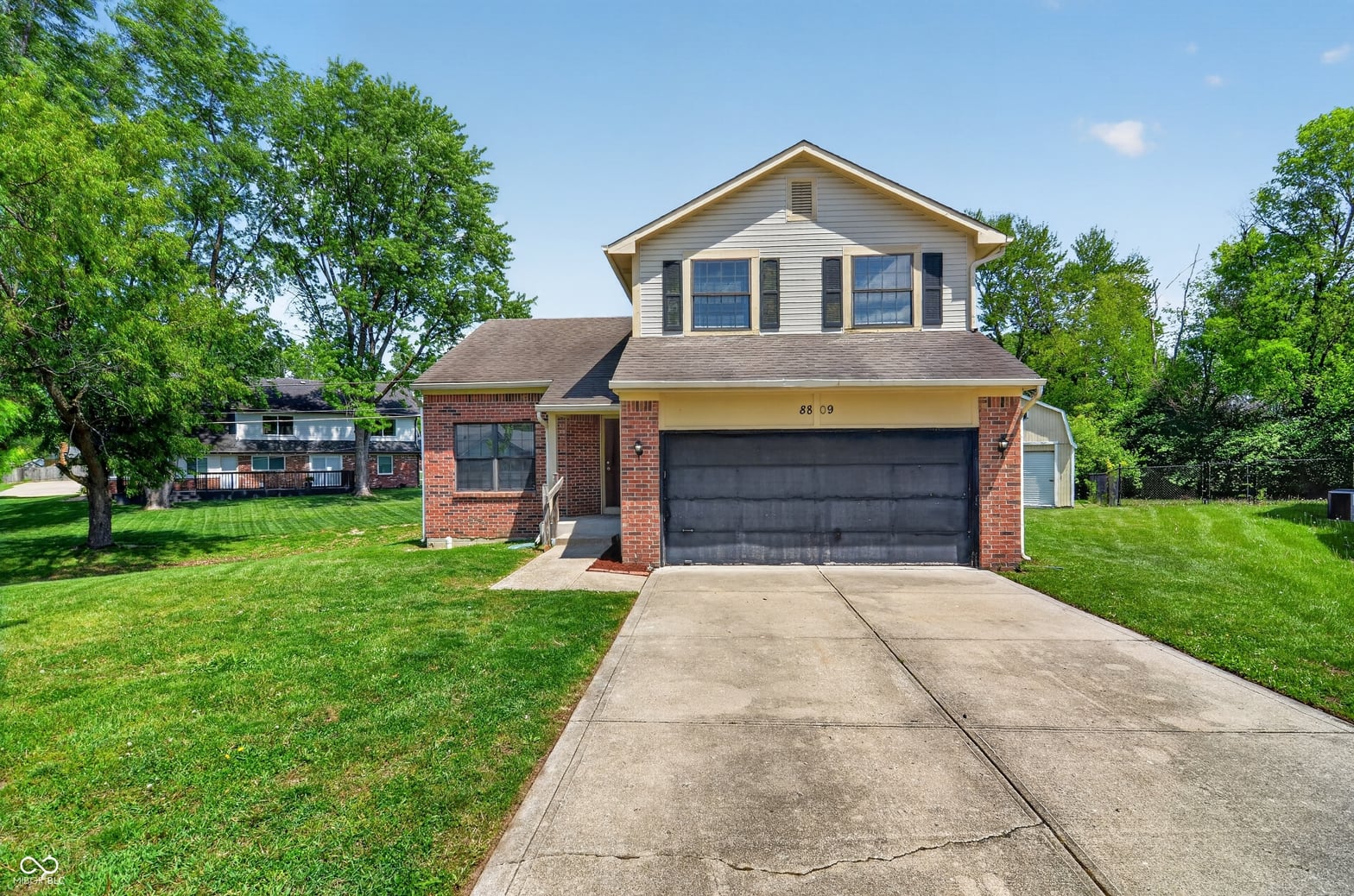 Front exterior at 8809 Country Lane Court, Indianapolis, IN