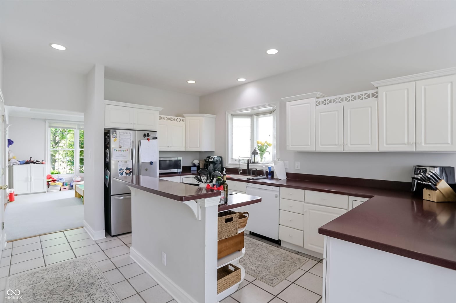Bright updated kitchen with island and ample storage.