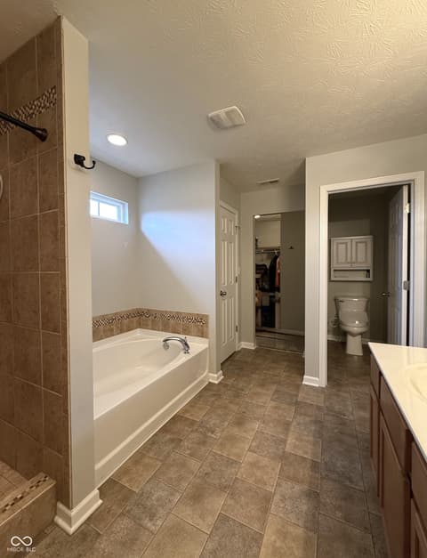 Primary bathroom at 1619 Beacon Pointe Boulevard, Brownsburg, IN