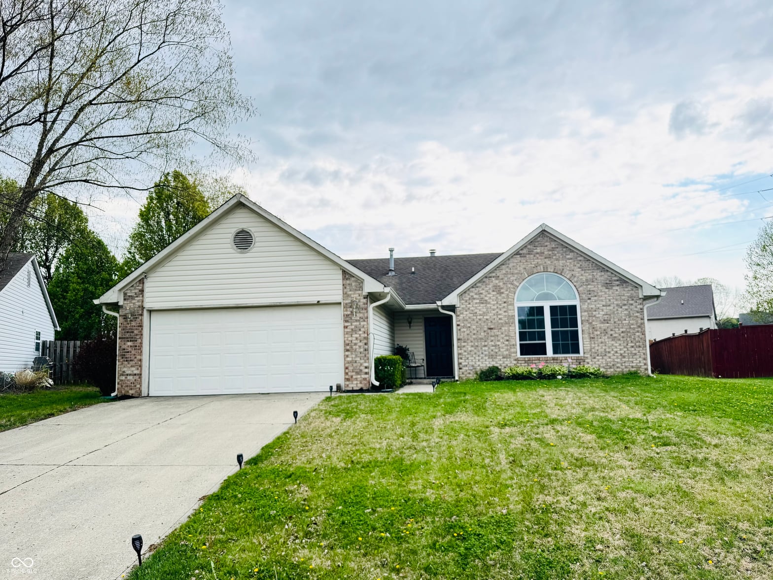 Front exterior at 831 Queensgate Drive, Greenwood, IN