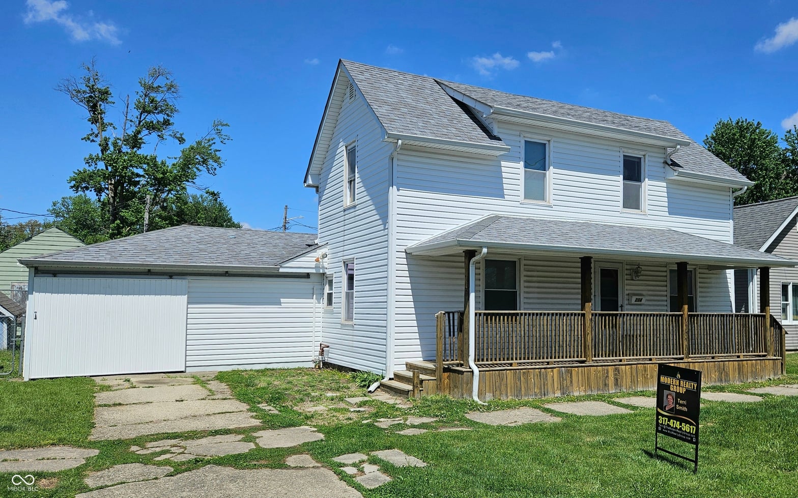 Front exterior at 214 E 9th Street, Rushville, IN
