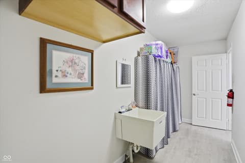 Laundry room at 14814 Drayton Drive, Noblesville, IN