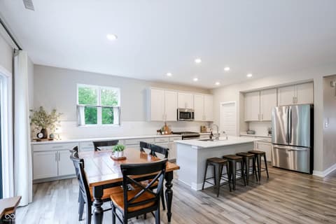 Kitchen at 17462 Cavalcade Circle, Noblesville, IN — Bright, updated kitchen with island and premium appliances.