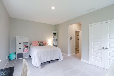 Primary bedroom at 17462 Cavalcade Circle, Noblesville, IN — Spacious primary bedroom with walk-in closet and ensuite.
