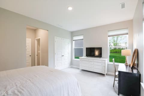 Primary bedroom at 17462 Cavalcade Circle, Noblesville, IN — Bright primary suite with ensuite and walk-in closet.