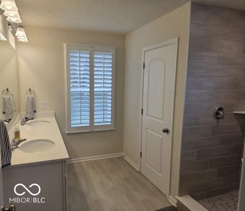 Primary bathroom at 852 Cowley Drive, Westfield, IN — Spacious primary bath with dual vanity and walk-in shower.