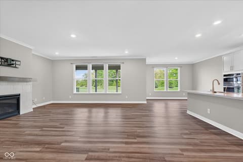 Hallway at 20237 Willenhall Court, Westfield, IN — Bright hallway with hardwood floors and modern finishes.