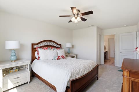 Primary bedroom at 14680 Hinton Drive, Fishers, IN — Spacious primary bedroom with ensuite bath access.