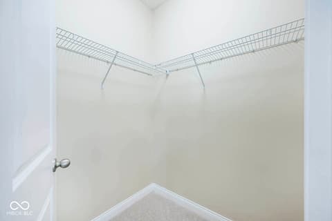 Laundry room at 6257 Strathaven Road, Noblesville, IN — Spacious laundry room with ample shelving and storage.