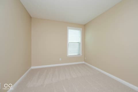 Bedroom at 6257 Strathaven Road, Noblesville, IN — Bright bedroom with neutral décor and clean finishes