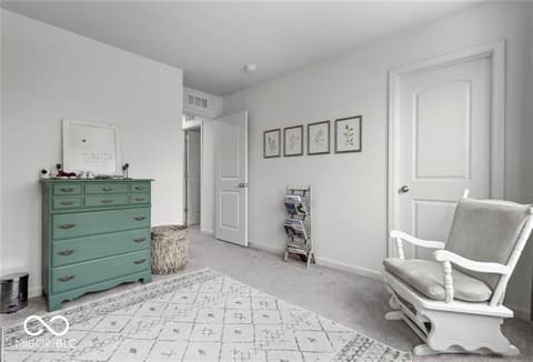 Primary bedroom at 14350 Ludwell Court, Fishers, IN — Bright, serene primary bedroom with farmhouse charm.