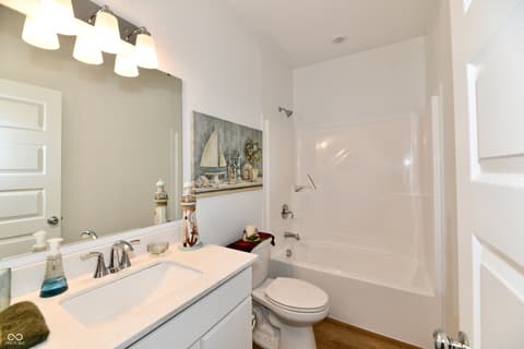Bathroom at 19406 Honeylocust Glen, Noblesville, IN — Bright, renovated bathroom with clean contemporary finishes.