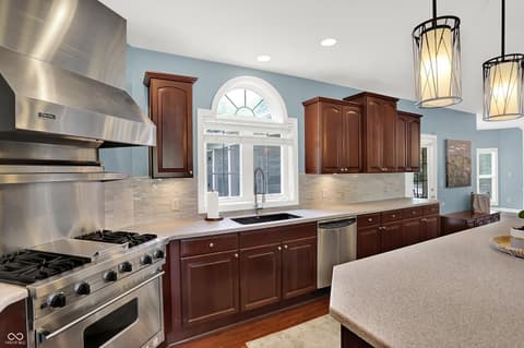 Kitchen at 10587 Proposal Pointe Way, Fishers, IN — Luxe updated kitchen with premium stainless steel appliances