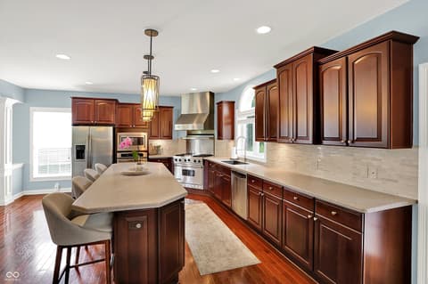 Kitchen at 10587 Proposal Pointe Way, Fishers, IN — Gorgeous renovated kitchen with premium finishes and island.