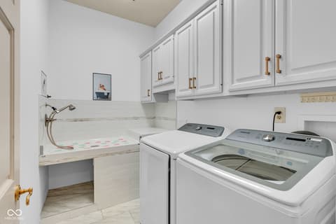 Laundry room at 3172 Smokey Ridge Lane, Carmel, IN