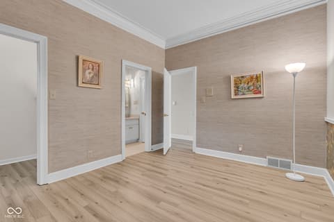 Primary bedroom at 3172 Smokey Ridge Lane, Carmel, IN — Spacious primary bedroom with ensuite and updated finishes.