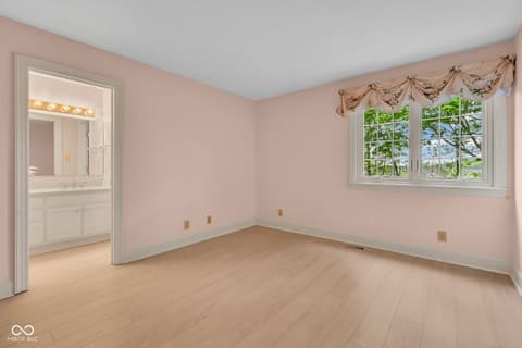 Primary bedroom at 3172 Smokey Ridge Lane, Carmel, IN — Spacious primary suite with ensuite bath and natural light.