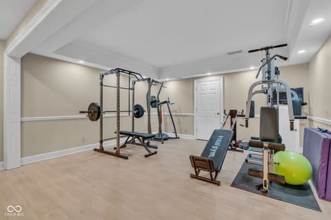 Basement at 3172 Smokey Ridge Lane, Carmel, IN — Fully equipped home gym with premium fitness equipment.