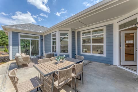 Outdoor living area at 16743 Sunland Farm Drive, Fishers, IN — Modern outdoor living space with direct interior access.