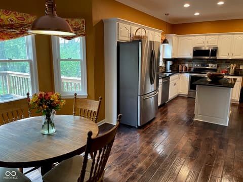 Kitchen at 3155 Jason Street, Carmel, IN — Bright updated kitchen with granite and stainless steel.