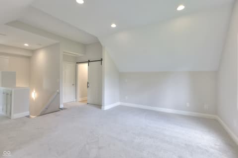 Primary bedroom at 11005 Cornell Street, Carmel, IN — Spacious primary suite with ensuite and modern finishes.
