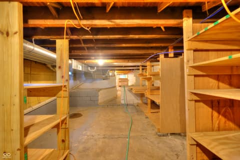 Basement at 11005 Cornell Street, Carmel, IN — Spacious unfinished basement ready for development.