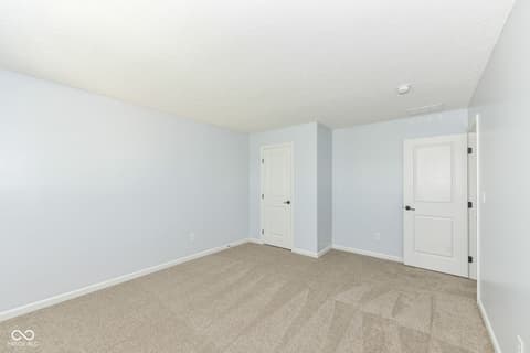 Bedroom at 11946 Eaglerun Way, Zionsville, IN — Bright, spacious bedroom with fresh neutral finishes.