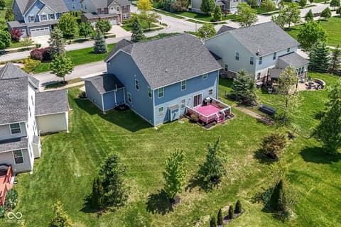 Outdoor living area at 11946 Eaglerun Way, Zionsville, IN — Expansive elevated deck with panoramic neighborhood views.