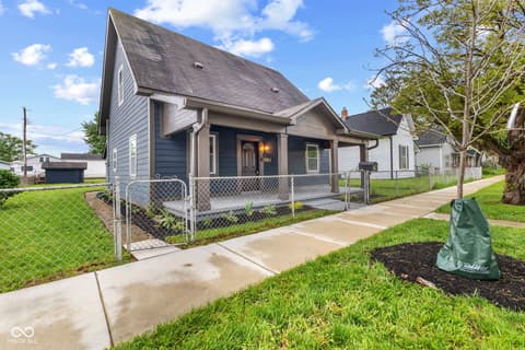 Front exterior at 1335 Christian Avenue, Noblesville, IN — Charming renovated farmhouse with welcoming front porch.