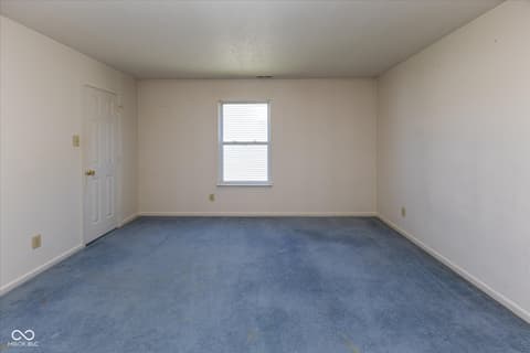 Bedroom at 10288 Brushfield Lane, Fishers, IN — Spacious bedroom with natural light and neutral finishes.