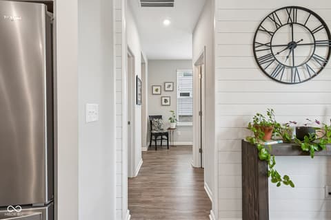 Hallway at 18757 Dooney Court, Noblesville, IN — Bright, updated hallway with farmhouse charm and finishes.