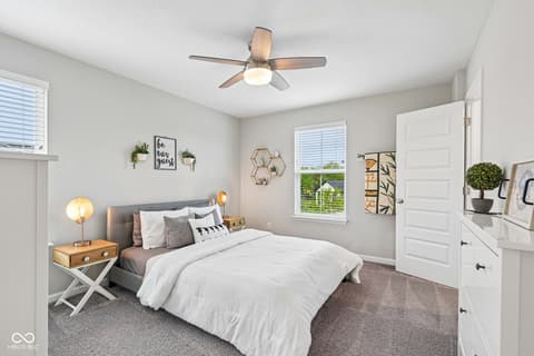 Primary bedroom at 18757 Dooney Court, Noblesville, IN — Bright, airy primary bedroom with modern finishes.