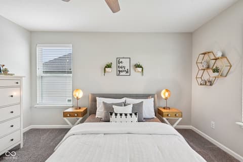 Bedroom at 18757 Dooney Court, Noblesville, IN — Bright, stylish bedroom with modern decor and smart storage.