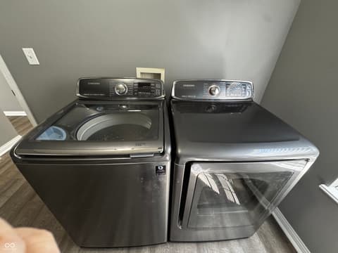 Laundry room at 13563 Guy Street, Fishers, IN — Modern Samsung washer/dryer set in dedicated laundry room.