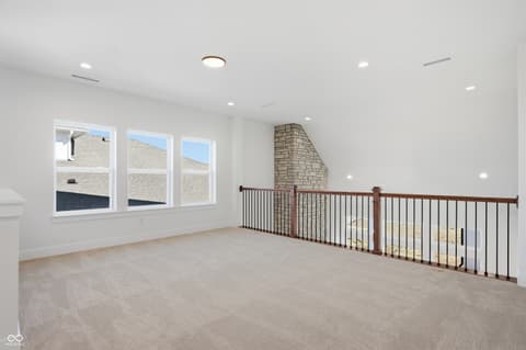 Bonus room at 1255 Chatham Hills Boulevard, Westfield, IN — Bright bonus room with large windows and modern finishes.