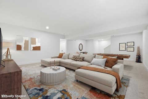 Family room at 1255 Chatham Hills Boulevard, Westfield, IN — Spacious modern family room with entertainment features.