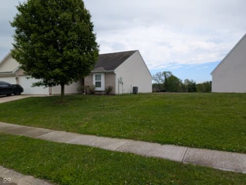 Side exterior at 6407 Emerald Springs Drive, Indianapolis, IN