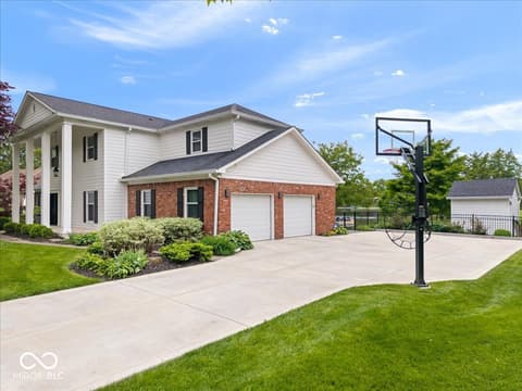 Side exterior at 11416 E Lakeshore Drive, Carmel, IN