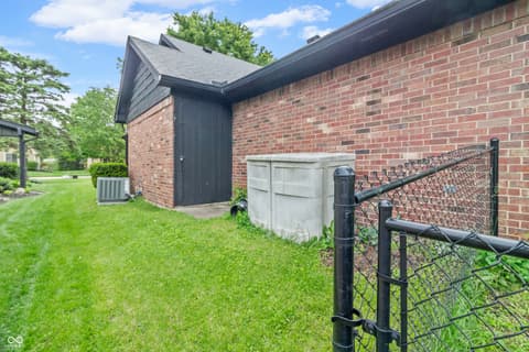 Side exterior at 7539 E 80th Street, Indianapolis, IN