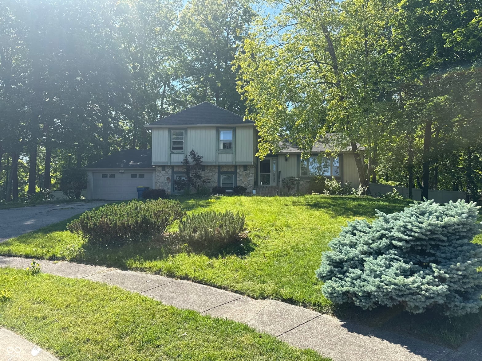 Front exterior at 10676 Oakwood Court, Carmel, IN