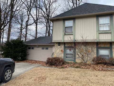 Front exterior at 10676 Oakwood Court, Carmel, IN