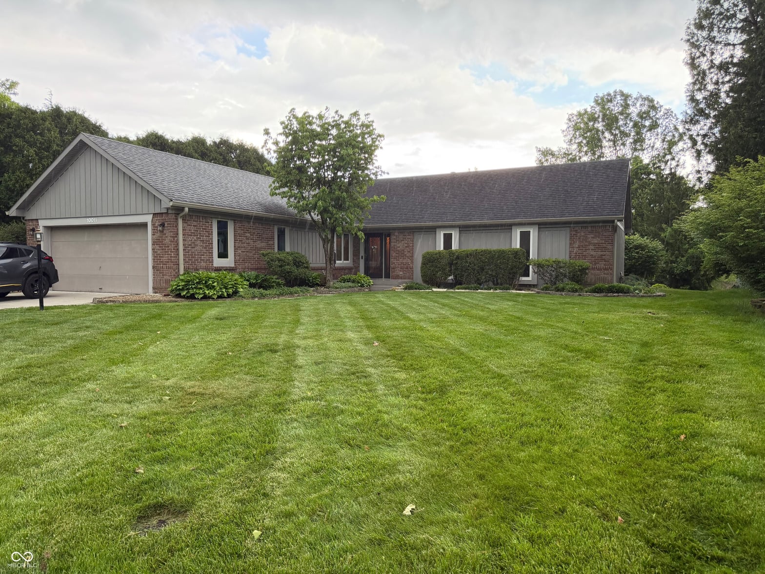 Front exterior at 10011 Harbour Pines Court, Indianapolis, IN
