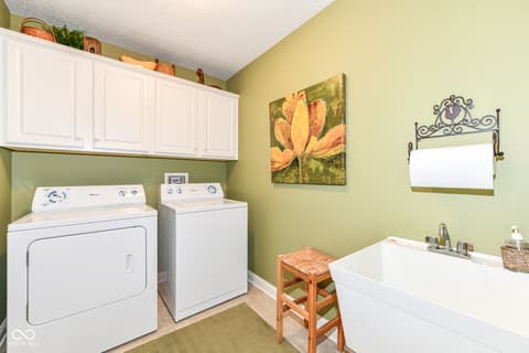 Laundry room at 13836 Rue Fontaine Lane, McCordsville, IN