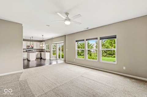 Family room at 5654 W Woodstock Trail, McCordsville, IN