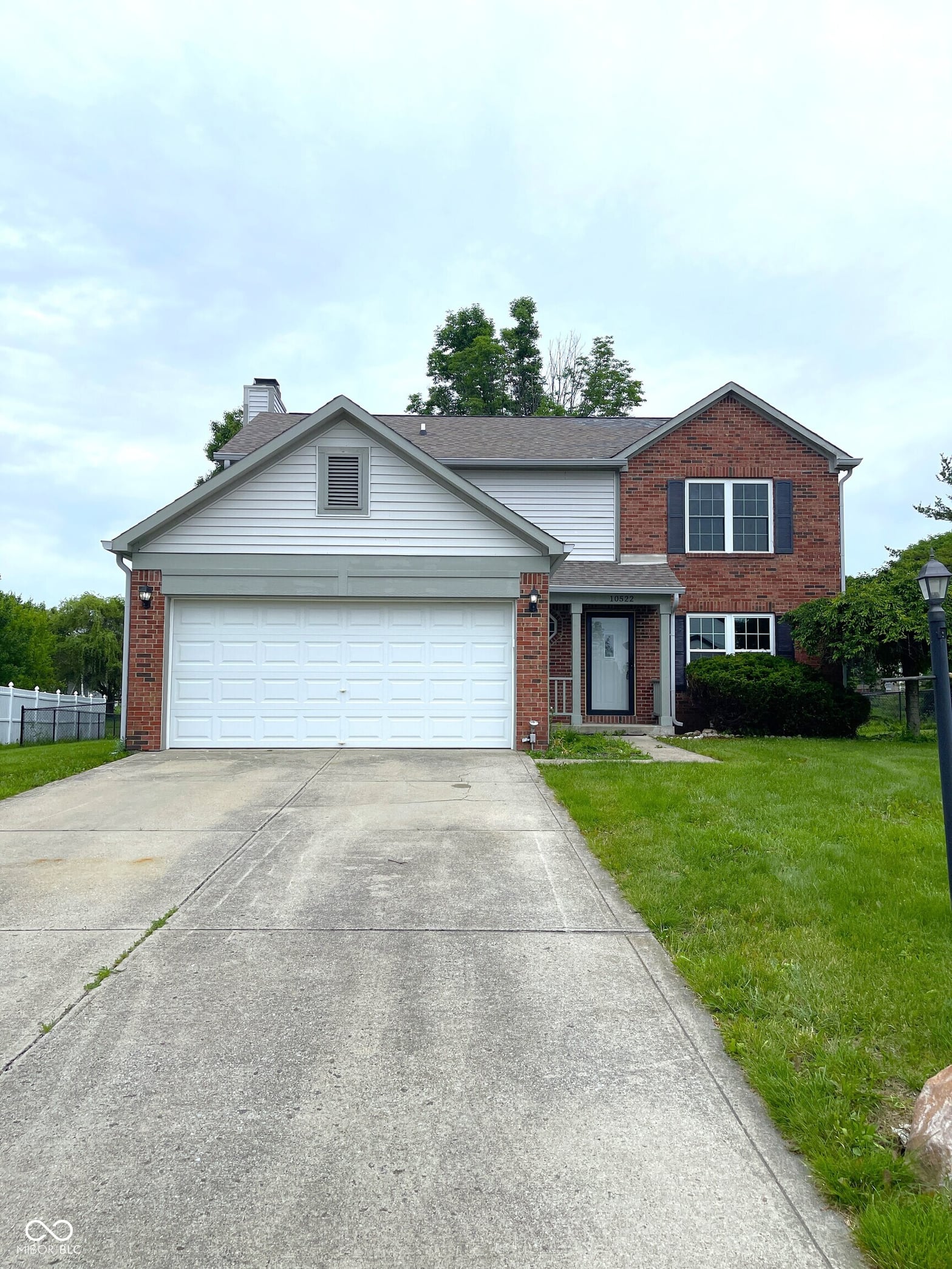 Front exterior at 10522 Creekside Woods Drive, Indianapolis, IN